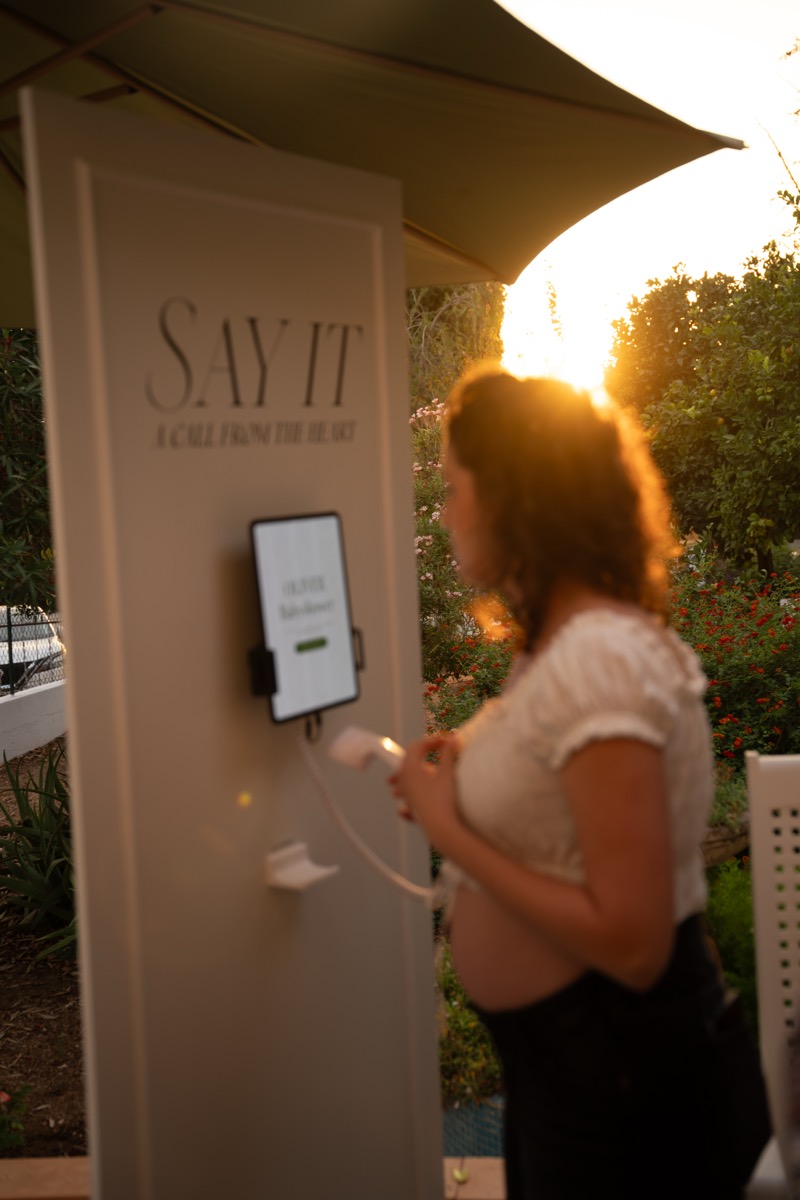 A guest picking up the handset
